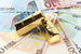 Goldbarren und Euro © Marén Wischnewski fotolia.com